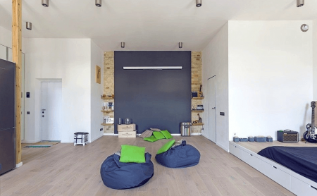 Интерьер просторной квартиры-студии в стиле «лофт»